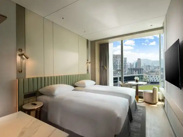 Marina-inspired guest room at Dorsett Kai Tak Hotel, Hong Kong with park view