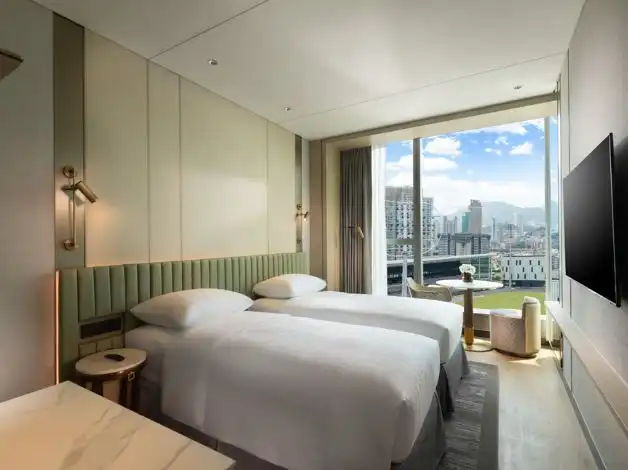 Modern guest room at Dorsett Kai Tak Hotel, Hong Kong with stylish interior